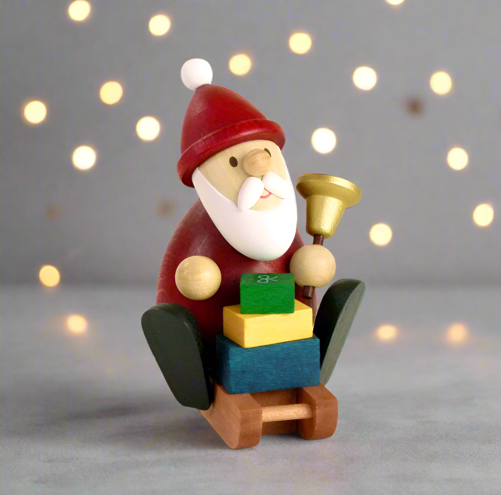 Weihnachtsmann Collectibles - Santa on a Sleigh with Bell & Gifts